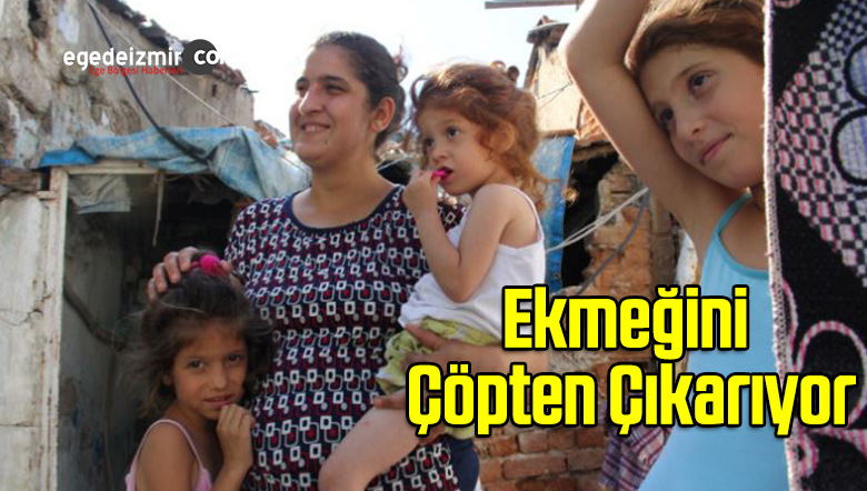 çöpten çıkarıyor