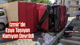 İzmir’de eşya taşıyan kamyon devrildi