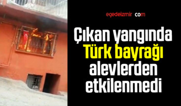 Alevlerin içinde kalan Türk bayrağı alevlerden etkilenmedi